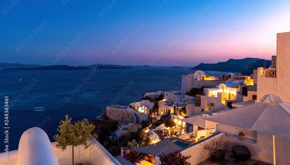 Oia village at the sunset - Aegean sea - Santorini island - Greece