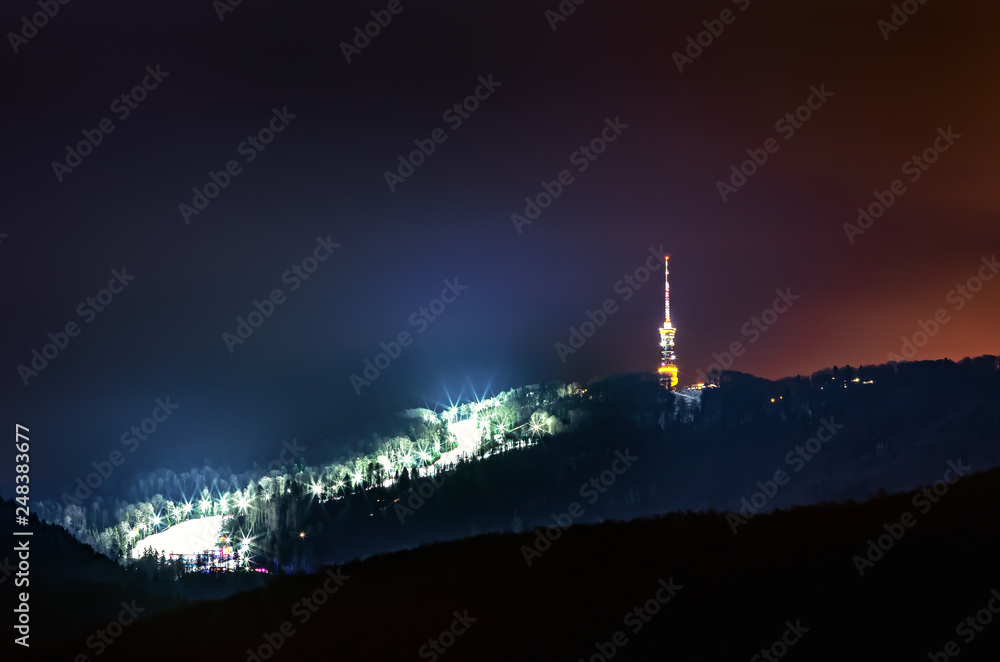 Night shot of Medvednica mountain in Zagreb with snow quenn ski slope