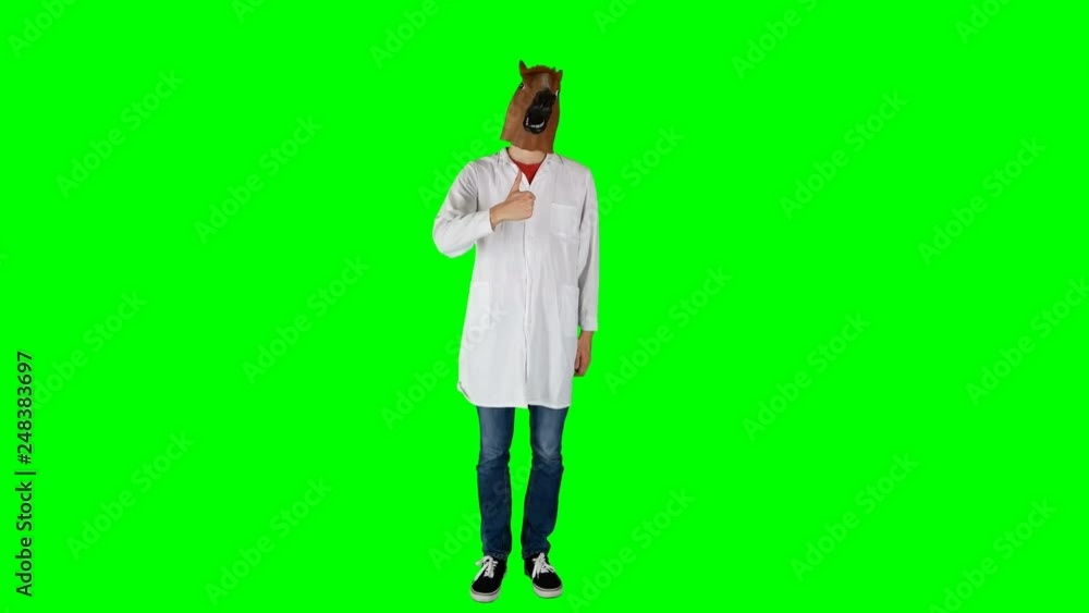Doctor Wearing a Lab Coat is Happy to Give Like Thumbs Up on a Green Screen Doctor Wearing a Lab Coat is Happy to Give Like Thumbs Up on a Green Screen