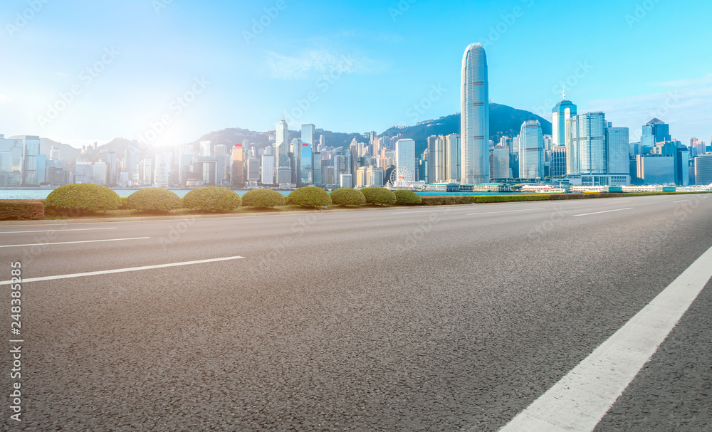 Road and skyline of modern urban architecture in Hong Kong.. Road and skyline of modern urban architecture in Hong Kong..