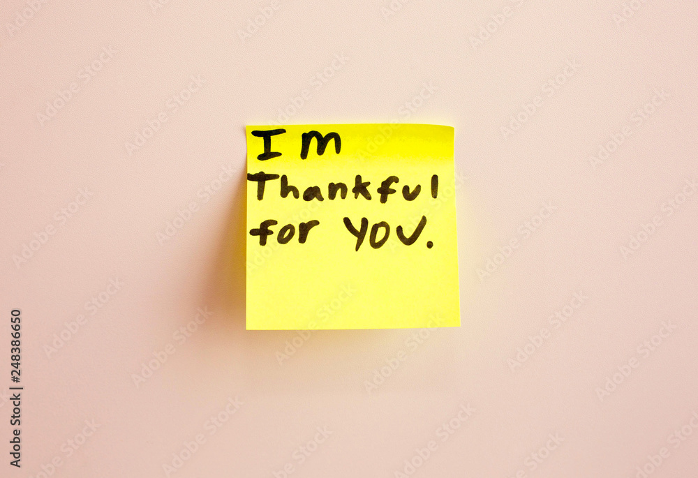 I am thankful for you note reminder yellow sticker on a wall, close up. Happy Mother's Day. I am thankful for you note reminder yellow sticker on a wall, close up. Happy Mother's Day.