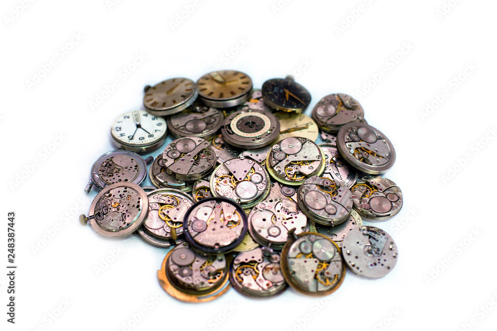 Details of clocks and mechanisms for repair, restoration and maintenance on a white background. Details of clocks and mechanisms for repair, restoration and maintenance on a white background.