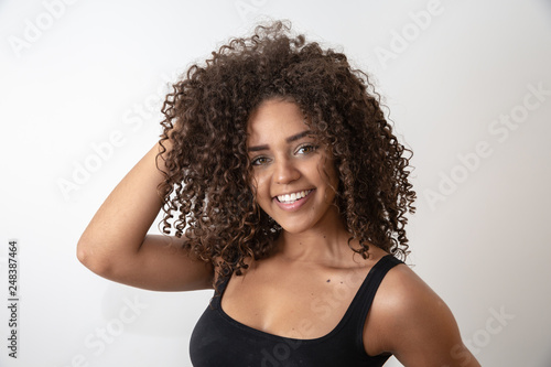 Beauty portrait of african american woman with afro hairstyle and glamour makeup