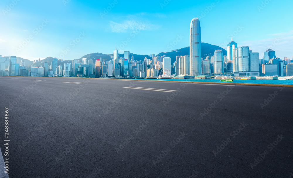Road and skyline of modern urban architecture in Hong Kong.. Road and skyline of modern urban architecture in Hong Kong..