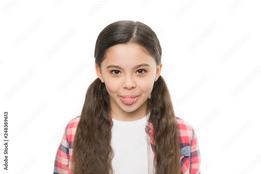 Being a real cutie. Little child with brunette hair showing tongue. Cute girl with long hairstyle. Little girl with stylish ponytail hairstyle. Small hair model with beauty look. Hair salon for kids Being a real cutie. Little child with brunette hair showing tongue. Cute girl with long hairstyle. Little girl with stylish ponytail hairstyle. Small hair model with beauty look. Hair salon for kids