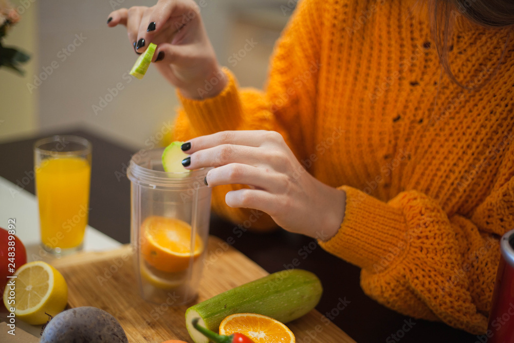 Vegetarian preparing vegan smoothie. Vegetarian preparing vegan smoothie.