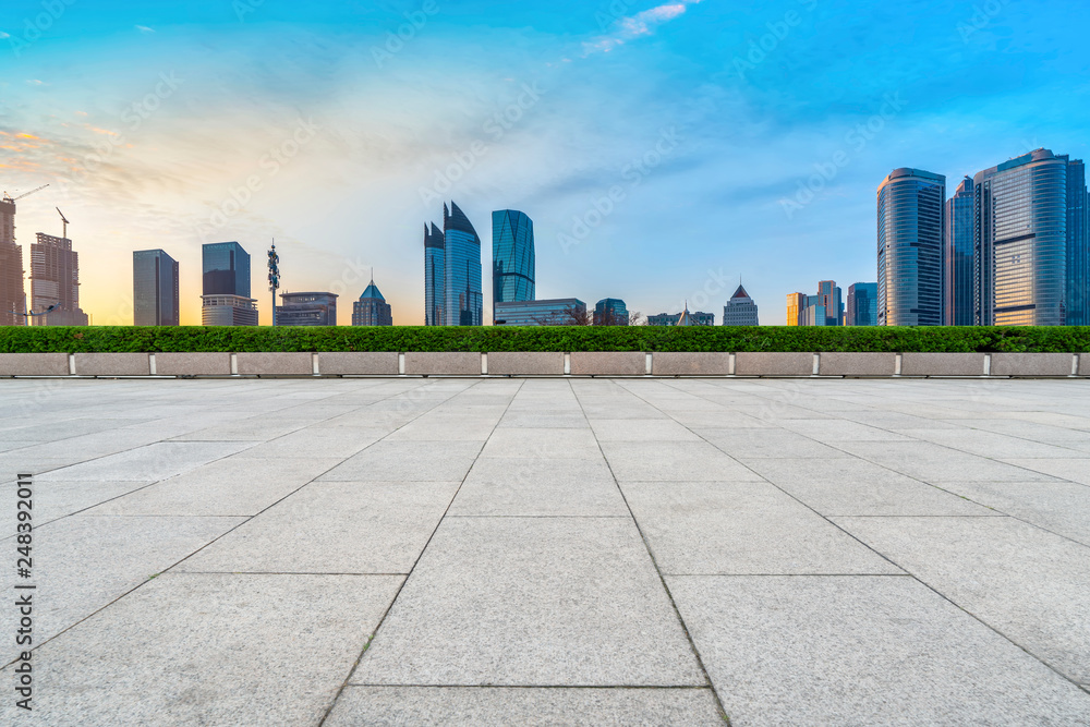 Empty Plaza Floor Bricks and the Skyline of Modern Urban Architecture in Qingdao.. Empty Plaza Floor Bricks and the Skyline of Modern Urban Architecture in Qingdao..