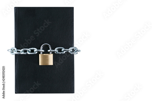 black book with chain and lock on white background photo