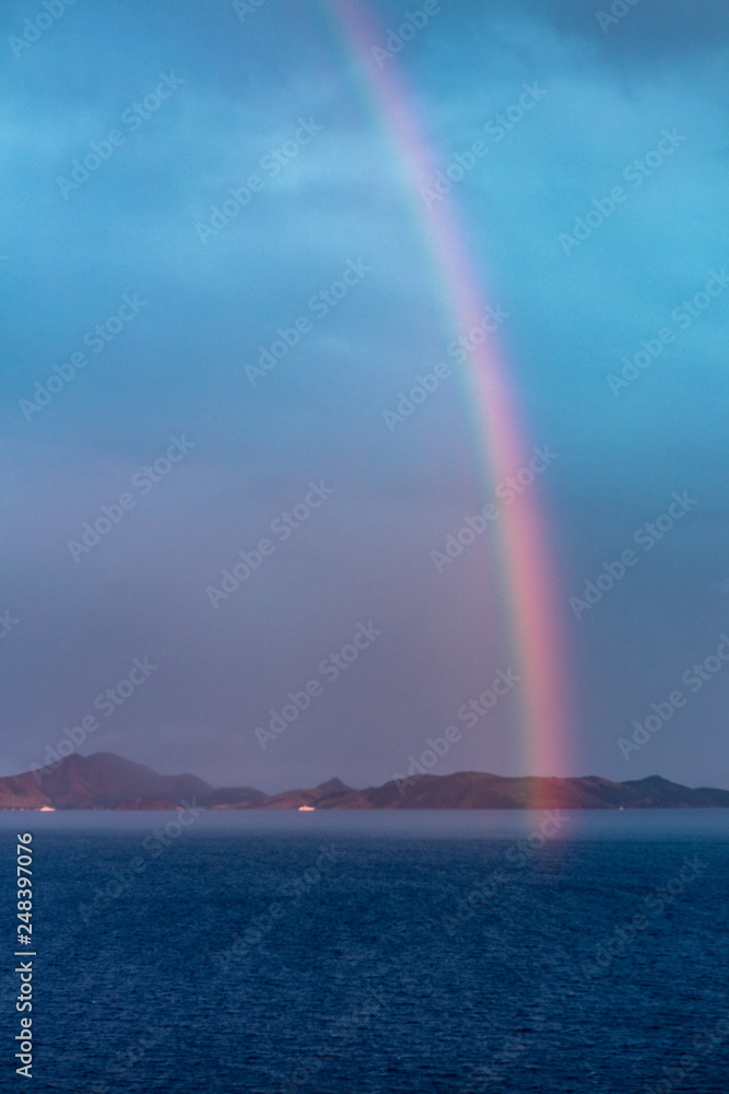 rainbow over sea rainbow over sea