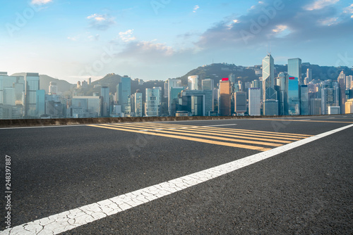 Road and skyline of modern urban architecture in Hong Kong.. #248397887