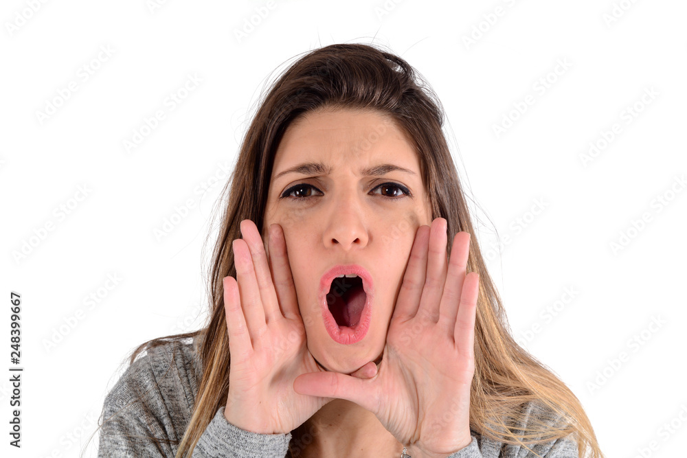 Young woman shouting and screaming Young woman shouting and screaming