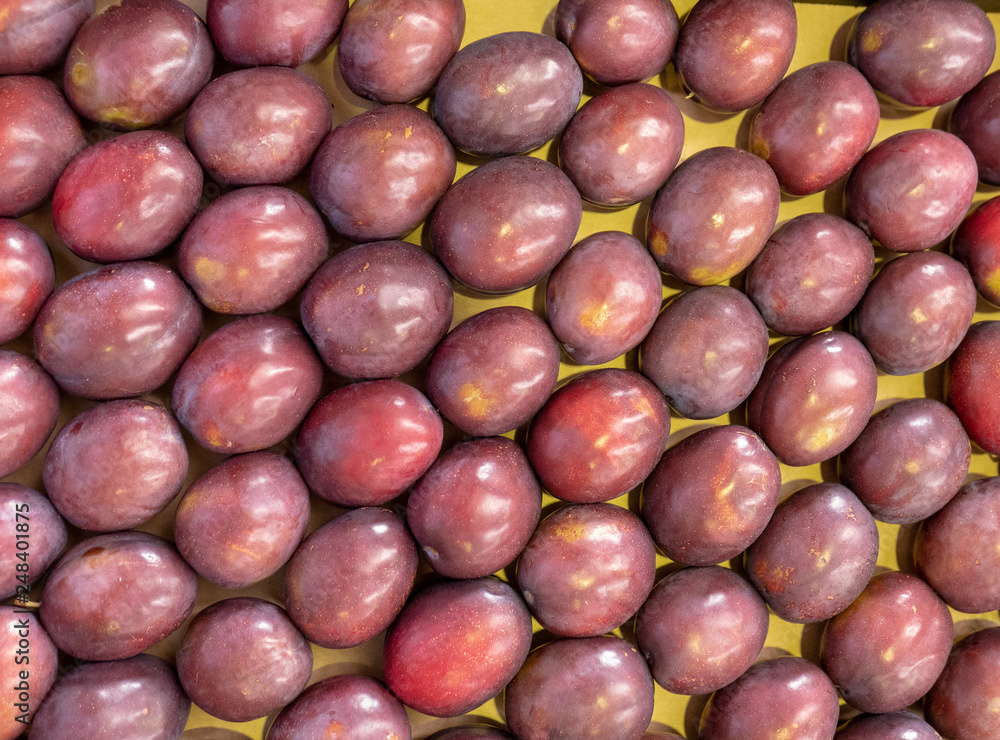 Obraz premium plums, fruit and vegetable exhibits