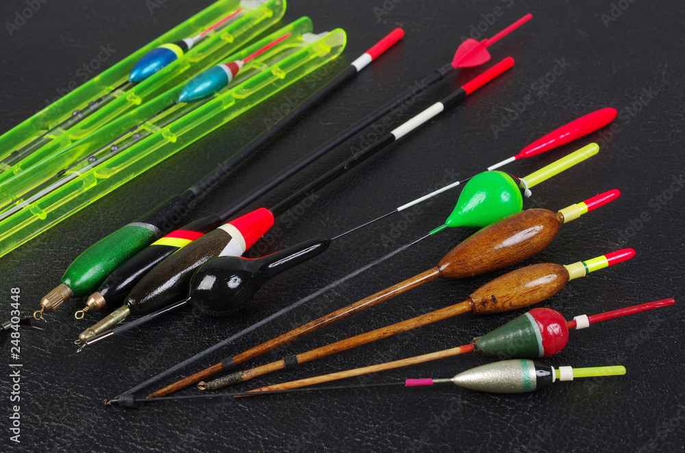 Fishing floats on a black background. Copy space Fishing floats on a black background. Copy space