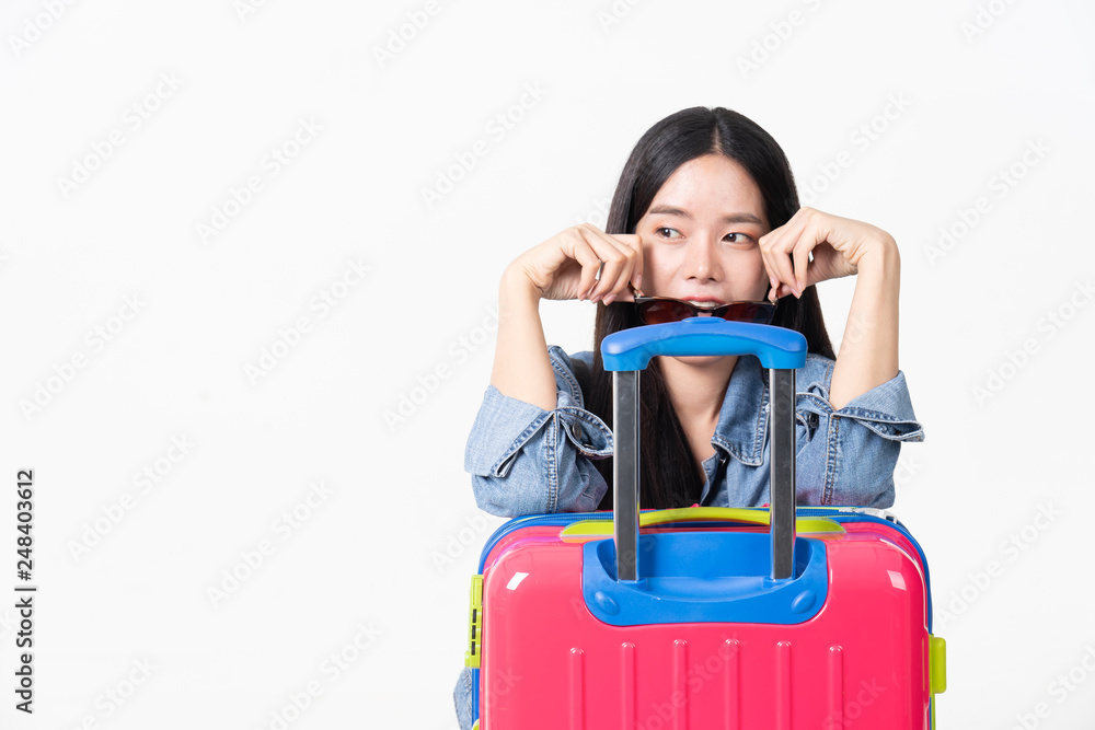 Traveler tourist woman in summer casual clothes.Asian Smiling woman wearing sun glasses.Passenger traveling abroad to travel on white background. Traveler tourist woman in summer casual clothes.Asian Smiling woman wearing sun glasses.Passenger traveling abroad to travel on white background.