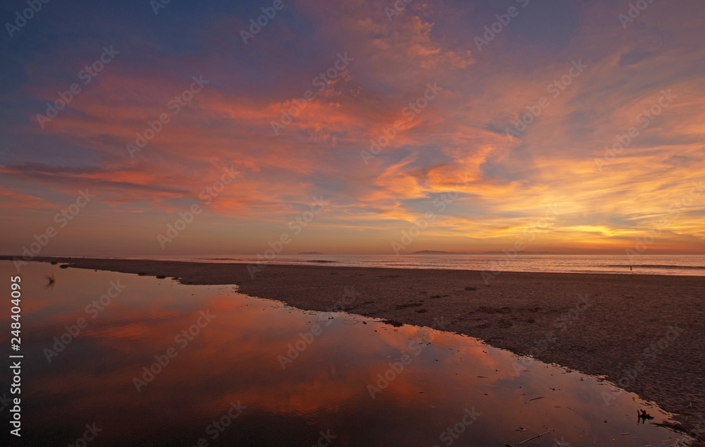 Sunset cloud reflection over Santa Clara river seaside marsh at Ventura beach in California United States Sunset cloud reflection over Santa Clara river seaside marsh at Ventura beach in California United States