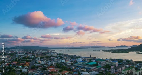 Time lapse Songkhla city skyline aerial view from above, moving clouds at sunset, Songkhla Province, South Thailand. photo