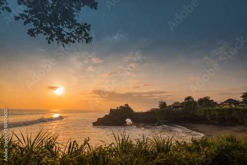 Silhouette Tanah Lot with sun set in evening at Bali, Indonesia.