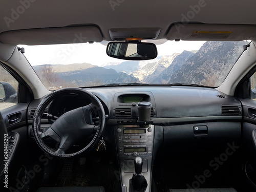 steering wheel car road sky clouds nature © sea and sun