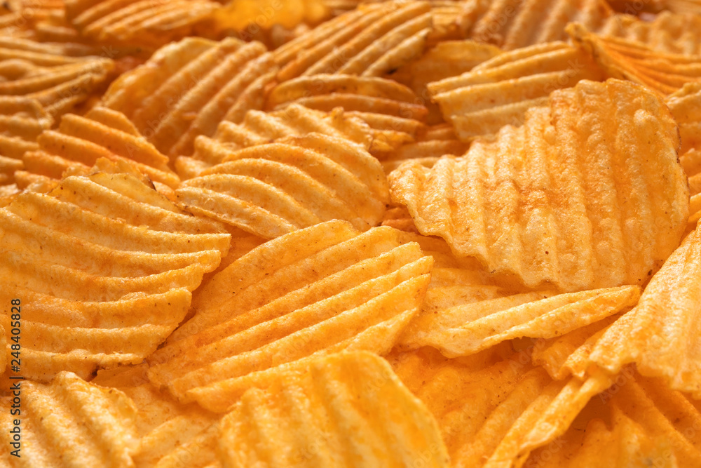 Relief potato chips closeup background Relief potato chips closeup background