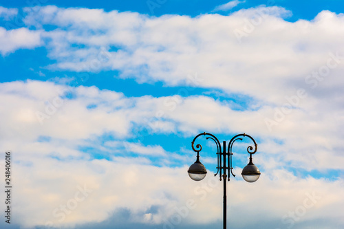 Street lamp against the blue sky