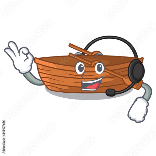 With headphone wooden boat beside the macot beach