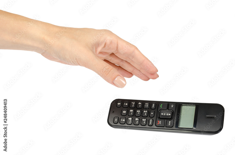 modern landline cordless phone with hand, old technology concept. modern landline cordless phone with hand, old technology concept.
