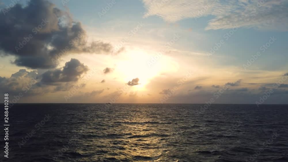 Beautiful Sunset and Sunrise in The Middle of The Ocean Beautiful Sunset and Sunrise in The Middle of The Ocean