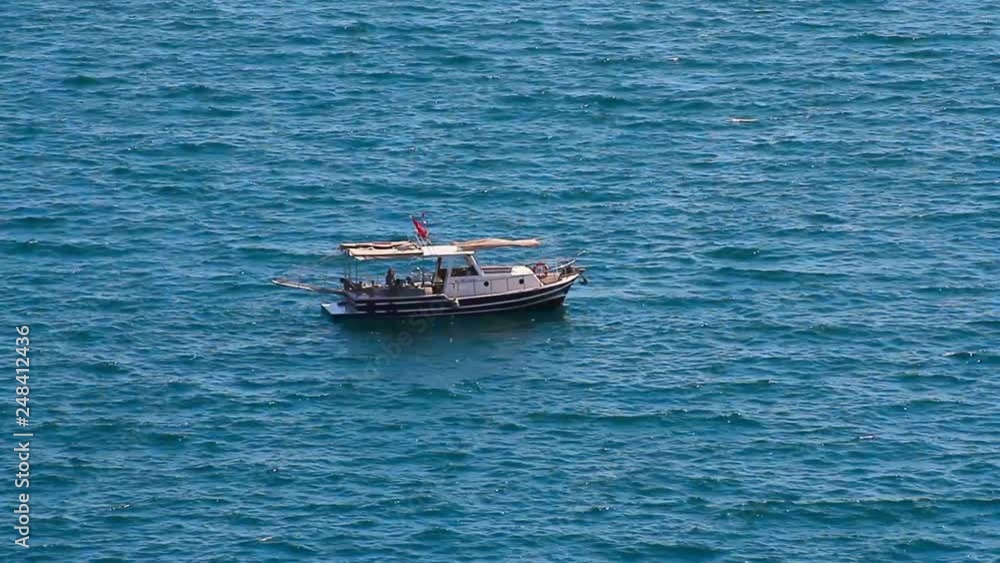 Small Recreational Fishing Boat with Turkish Flag Small Recreational Fishing Boat with Turkish Flag