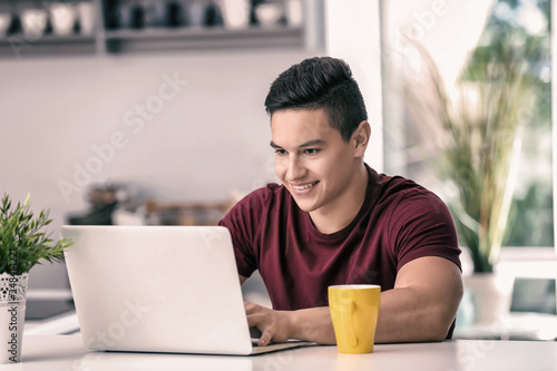 Young freelancer working on...