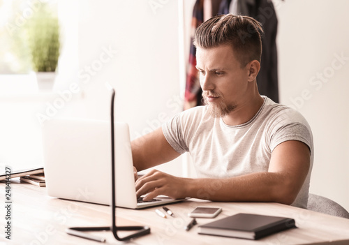 Handsome freelancer working...
