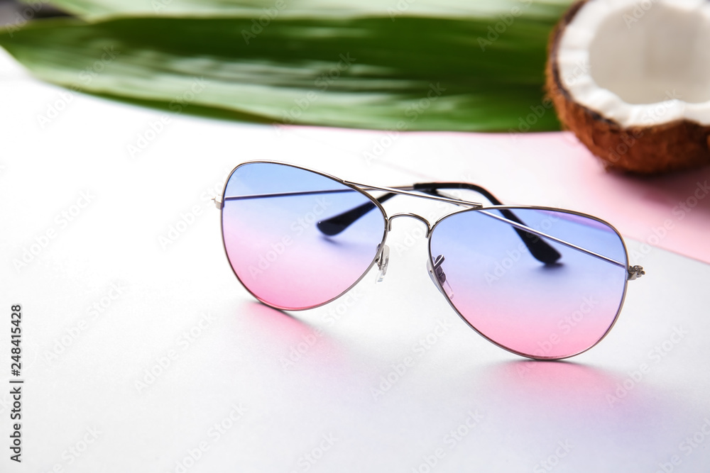 Stylish sunglasses on white background Stylish sunglasses on white background