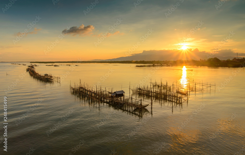 Underwater fish trap .Gold backgrounds textures in the twilight. Underwater fish trap .Gold backgrounds textures in the twilight.