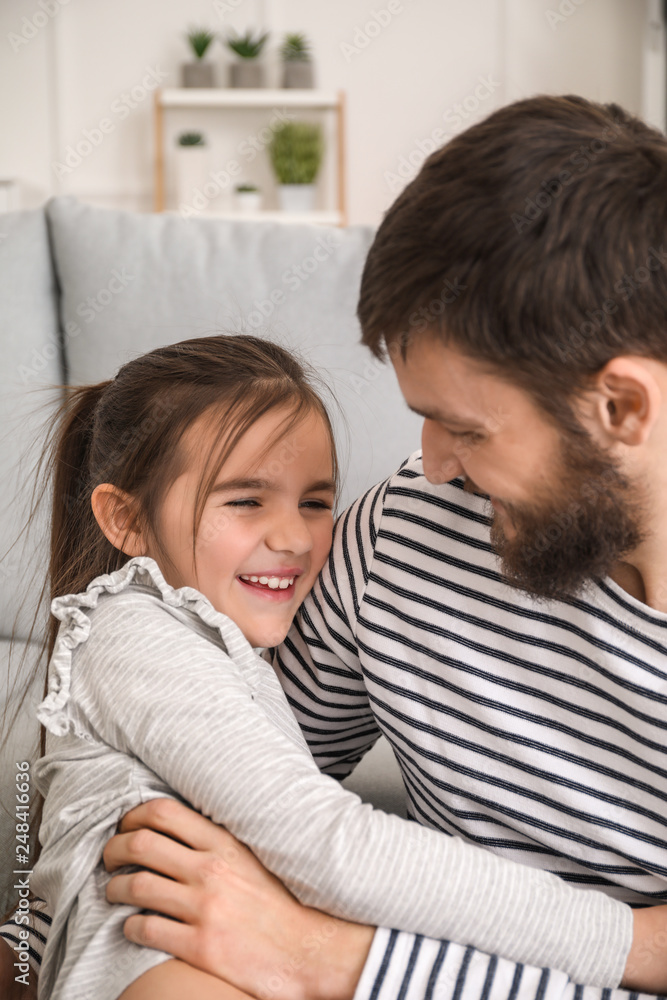 Father with his cute little daughter at home Father with his cute little daughter at home