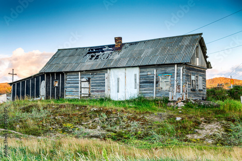 Old wooden house on a sunny bright day