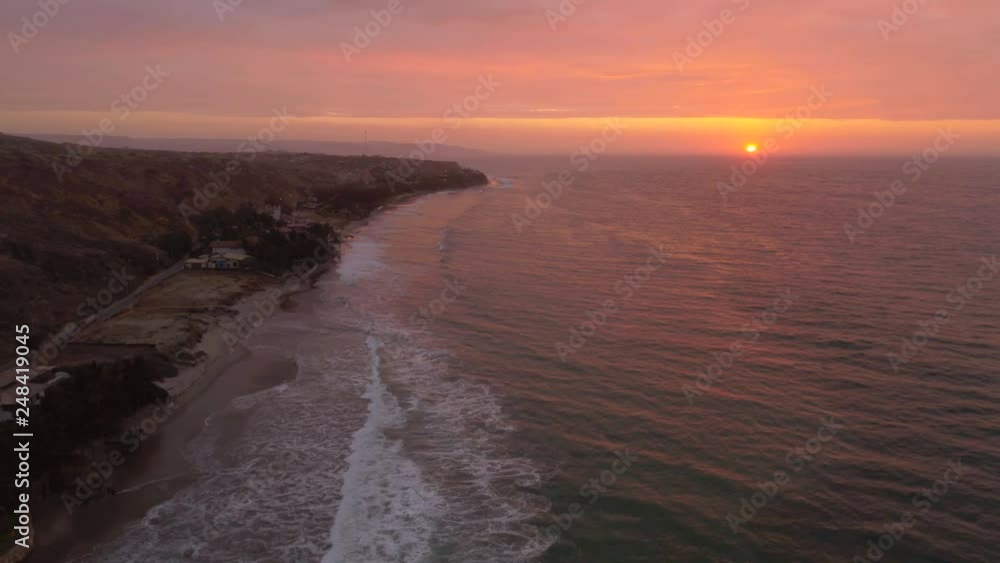 Sunset at a beach with the Pacific Ocean. Mancora, Peru, South America. Aerial video footage Sunset at a beach with the Pacific Ocean. Mancora, Peru, South America. Aerial video footage
