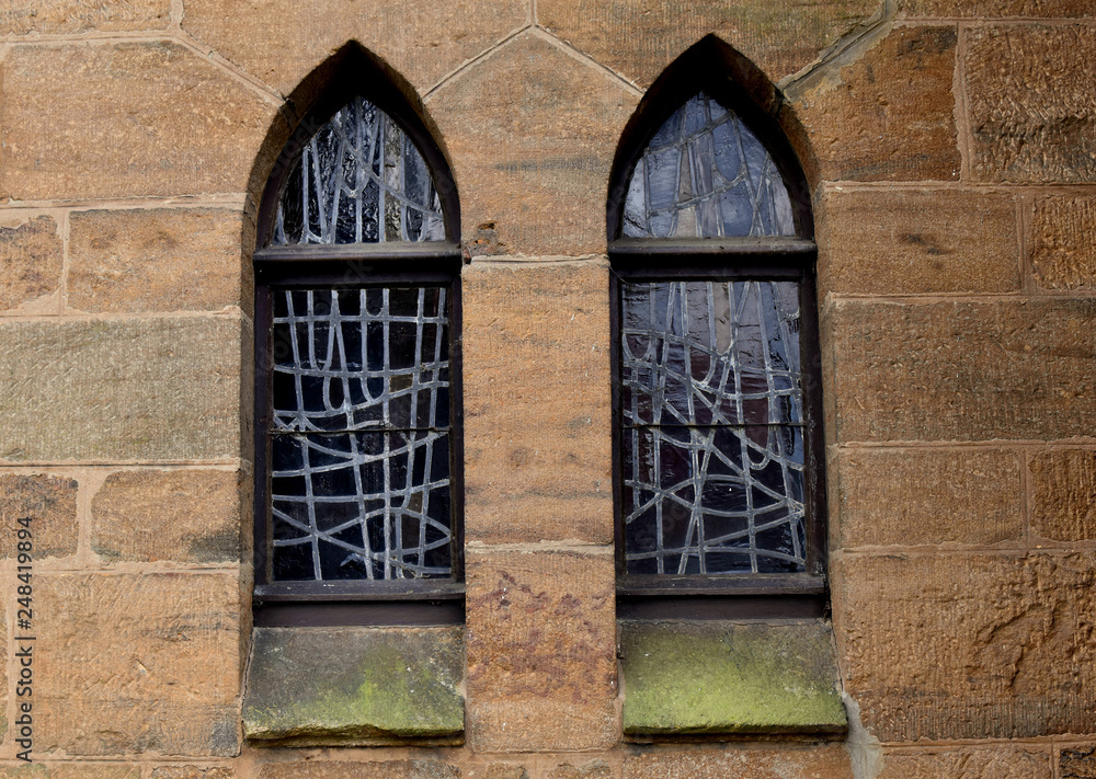 Obraz premium Fragment of a building with a window.Evangelical church.St. Paul's Church in Bünde.Germany.