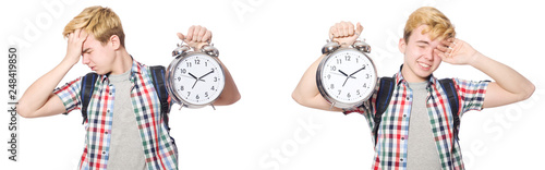 Young boy with alarm-clock in time management concept