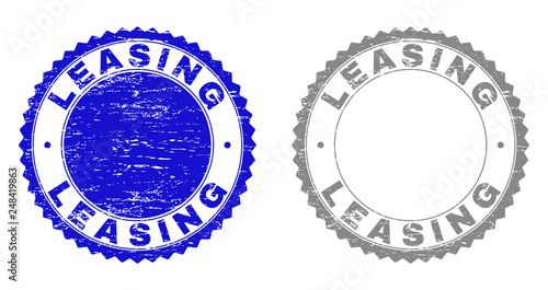 Grunge LEASING stamp seals isolated on a white background. Rosette seals with grunge texture in blue and gray colors. Vector rubber overlay of LEASING tag inside round rosette.