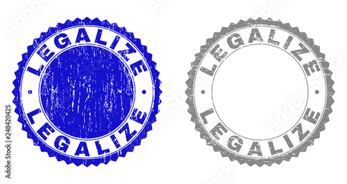 Grunge LEGALIZE stamp seals isolated on a white background. Rosette seals with grunge texture in blue and gray colors. Vector rubber stamp imitation of LEGALIZE tag inside round rosette.