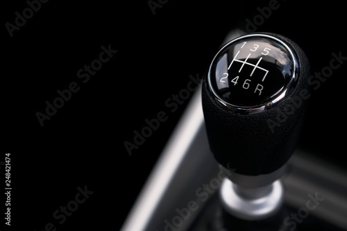 Gearbox gear stick manual control of power in car interior