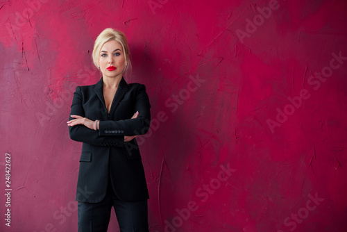 Business fashionable style for ladies. Clothes and fashion concept. Woman in black suit  © T.Den_Team