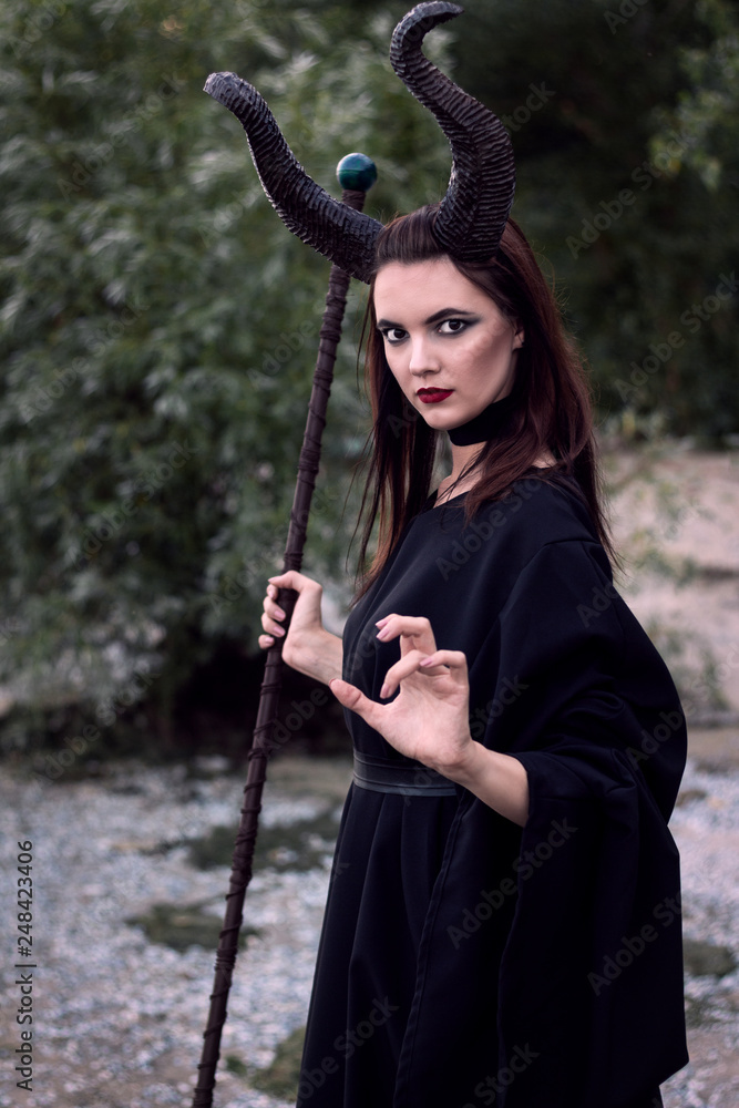 Wicked Maleficent without wings with a staff. Malesessy photo session. Wicked Maleficent without wings with a staff. Malesessy photo session.