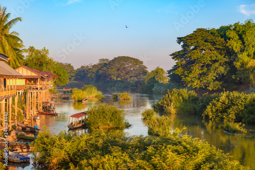 Photos Mekong River 4000 islands Laos, sunrise dramatic sky, mist fog on water, famous