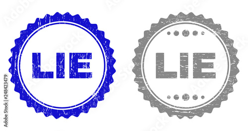 Grunge LIE stamp seals isolated on a white background. Rosette seals with distress texture in blue and gray colors. Vector rubber stamp imitation of LIE text inside round rosette.