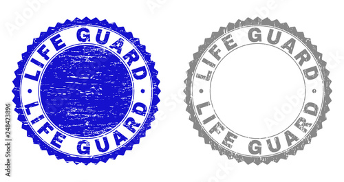 Grunge LIFE GUARD stamp seals isolated on a white background. Rosette seals with distress texture in blue and grey colors. Vector rubber stamp imitation of LIFE GUARD title inside round rosette.