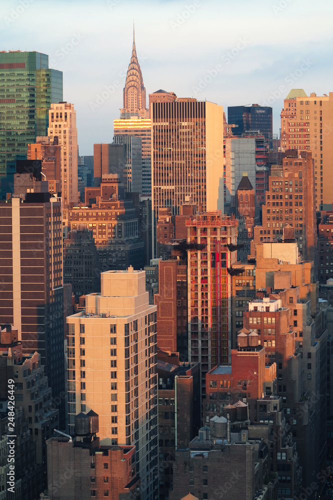 Obraz premium Aerial and panorama view of skyscrapers of New York City, Manhattan. Top view of night midtown of Manhattan.