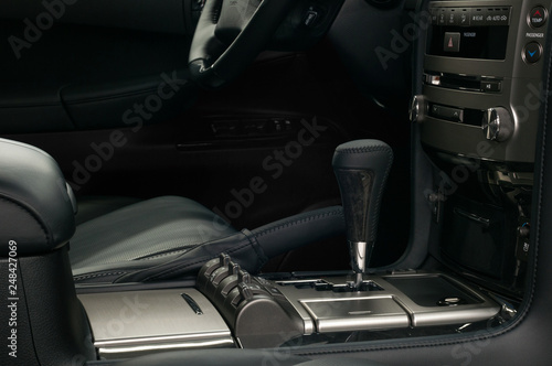 Modern car interior detail. Automatic transmission gear shift. © alexdemeshko