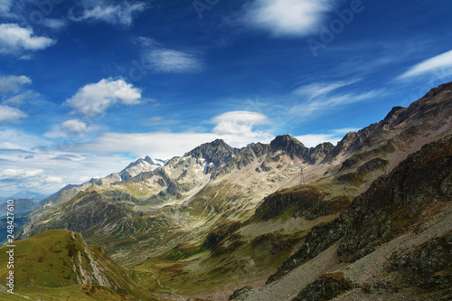 A great warm autumn in France in the Alpine mountains on tourist paths with magnificent views around.