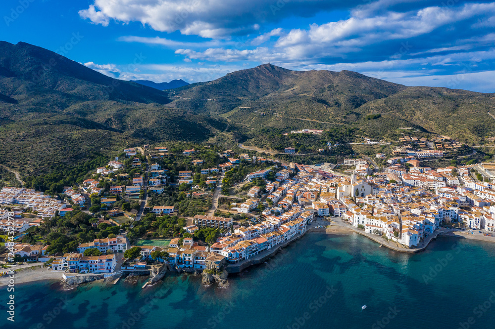 Aerial view of Cadaques Spain. Sea, mountains and beautiful city with white houses. Drone photo