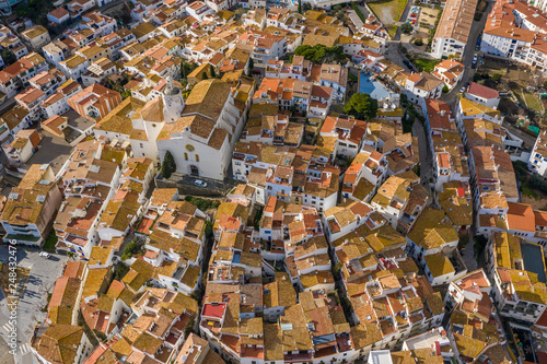 Aerial view of tiled roofs of Cadaques Spain. View from above. Sunny day in Spain. Drone photo